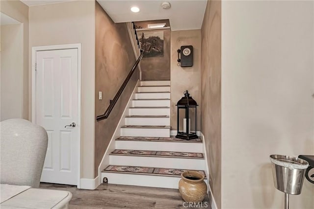 19639 Ellis Henry Ct, Newhall, CA 91321 - staircase featuring wood finished floors and recessed lighting