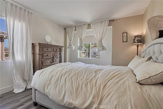 19639 Ellis Henry Ct, Newhall, CA 91321 - bedroom with wood finished floors and baseboards