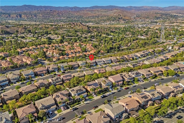 19639 Ellis Henry Ct, Newhall, CA 91321 - aerial overview of property's location featuring mountains and nearby suburban area