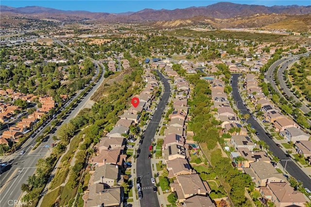 19639 Ellis Henry Ct, Newhall, CA 91321 - aerial view of property and surrounding area with nearby suburban area and a mountainous background