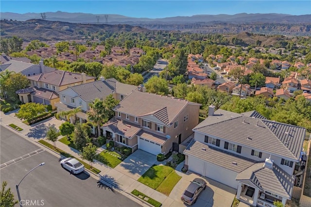 19639 Ellis Henry Ct, Newhall, CA 91321 - aerial view of residential area featuring a mountain backdrop
