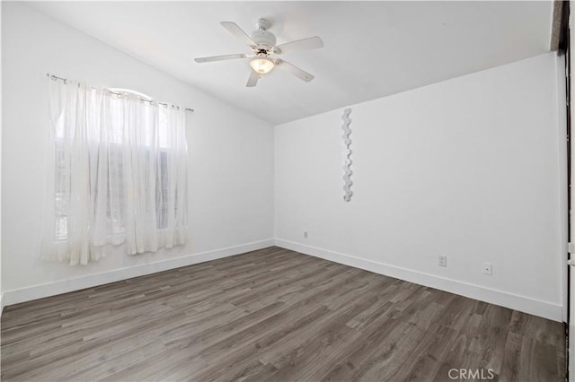 3624 Comet Ct, Palmdale, CA 93550 - empty room with wood finished floors, a ceiling fan, and vaulted ceiling