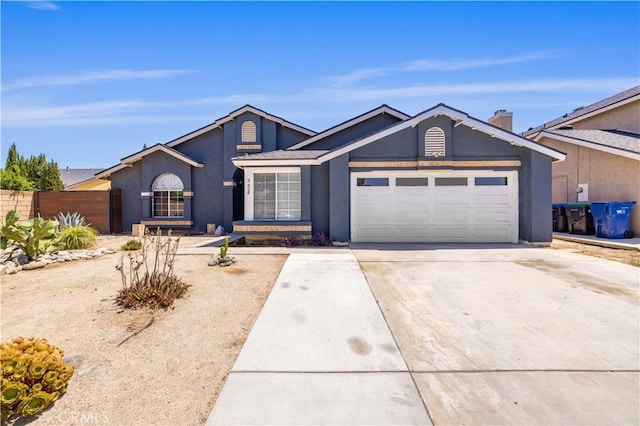3624 Comet Ct, Palmdale, CA 93550 - single story home featuring stucco siding, a garage, and driveway