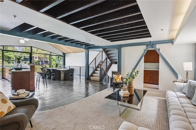 686 Diamond St, Laguna Beach, CA 92651 - living room featuring stairway and stone tile floors