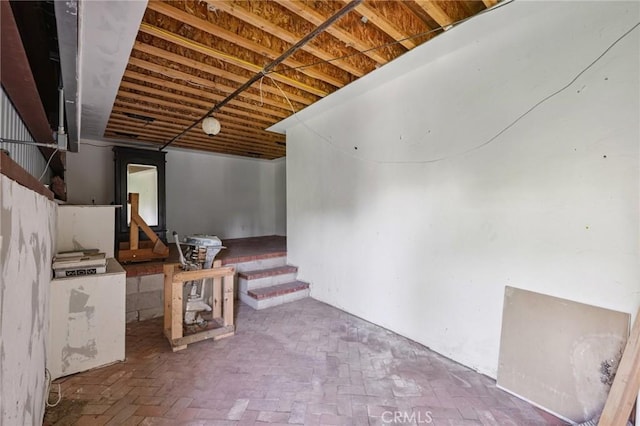 686 Diamond St, Laguna Beach, CA 92651 - unfinished basement with brick floors and stairway