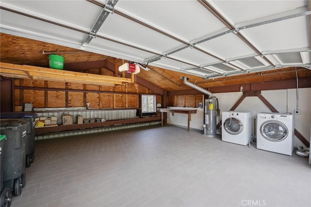 686 Diamond St, Laguna Beach, CA 92651 - garage with water heater, a garage door opener, and washing machine and clothes dryer