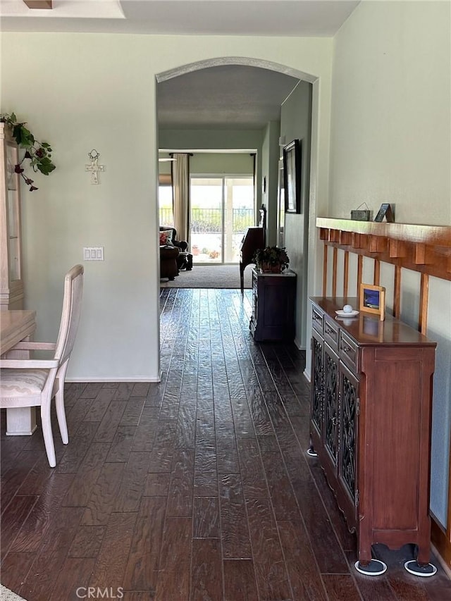 28433 Oasis View Cir, Menifee, CA 92584 - hallway with dark wood finished floors and arched walkways