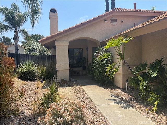 39830 Creative Dr, Temecula, CA 92591 - property entrance with stucco siding and a tile roof