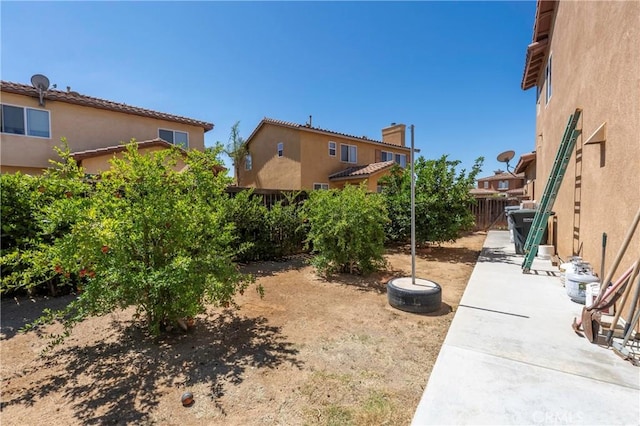 1182 Chenin Blanc Cir, Perris, CA 92571 - fenced backyard featuring a patio