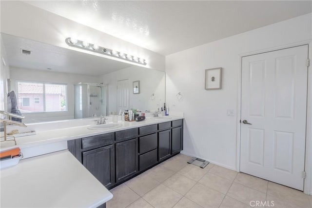 1182 Chenin Blanc Cir, Perris, CA 92571 - full bath featuring a shower stall, double vanity, and tile patterned floors