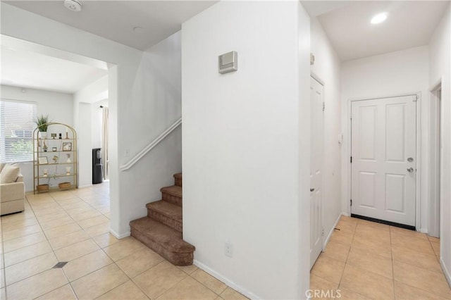 1182 Chenin Blanc Cir, Perris, CA 92571 - hall featuring light tile patterned flooring, stairs, and recessed lighting