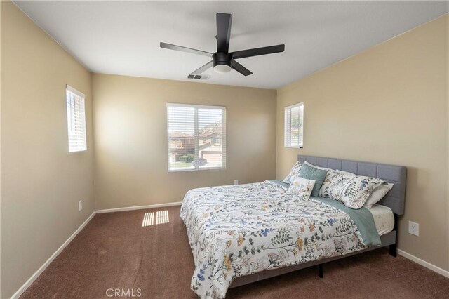 1182 Chenin Blanc Cir, Perris, CA 92571 - carpeted bedroom with baseboards and a ceiling fan