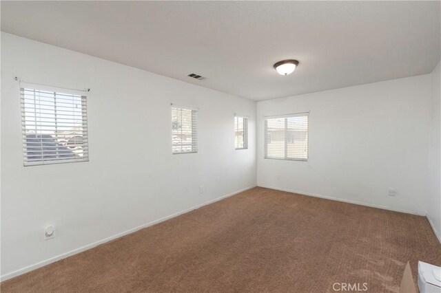 1182 Chenin Blanc Cir, Perris, CA 92571 - empty room with carpet