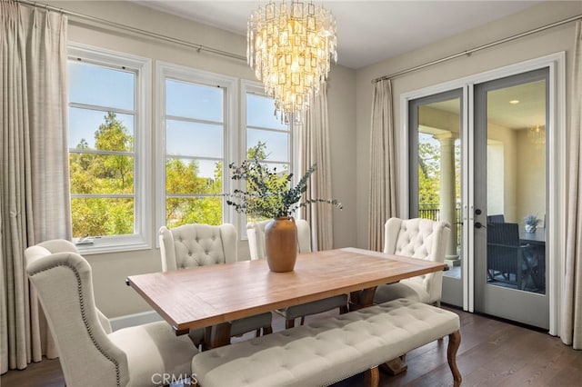23500 Park Sorrento Unit H32, Calabasas, CA 91302 - dining room featuring a chandelier, wood finished floors, and french doors