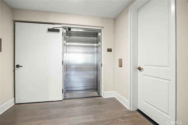 23500 Park Sorrento Unit H32, Calabasas, CA 91302 - hall with wood finished floors and elevator