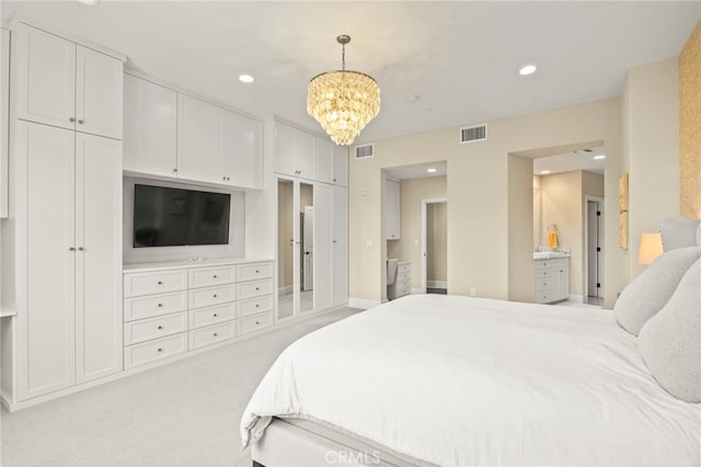23500 Park Sorrento Unit H32, Calabasas, CA 91302 - bedroom with recessed lighting, a chandelier, light carpet, and connected bathroom