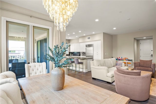 23500 Park Sorrento Unit H32, Calabasas, CA 91302 - dining space featuring a chandelier, dark wood finished floors, and recessed lighting