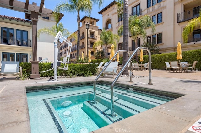 23500 Park Sorrento Unit H32, Calabasas, CA 91302 - view of swimming pool with a swimming pool and a hot tub