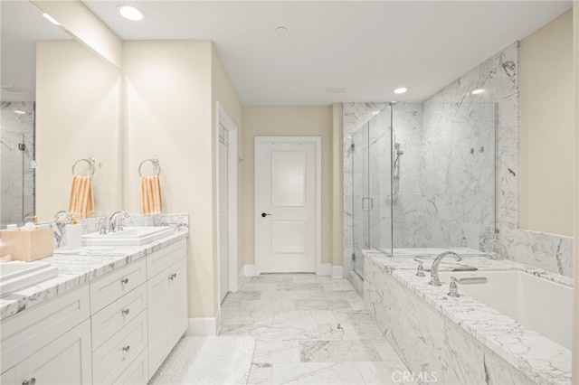 23500 Park Sorrento Unit H32, Calabasas, CA 91302 - bathroom with marble finish flooring, a marble finish shower, a garden tub, double vanity, and recessed lighting