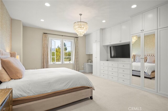 23500 Park Sorrento Unit H32, Calabasas, CA 91302 - bedroom with a chandelier, light carpet, and recessed lighting