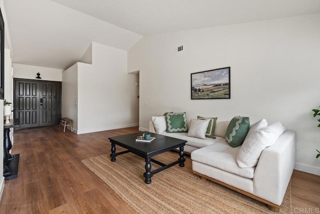 2663 Sutter St, Carlsbad, CA 92010 - living room featuring high vaulted ceiling and wood finished floors