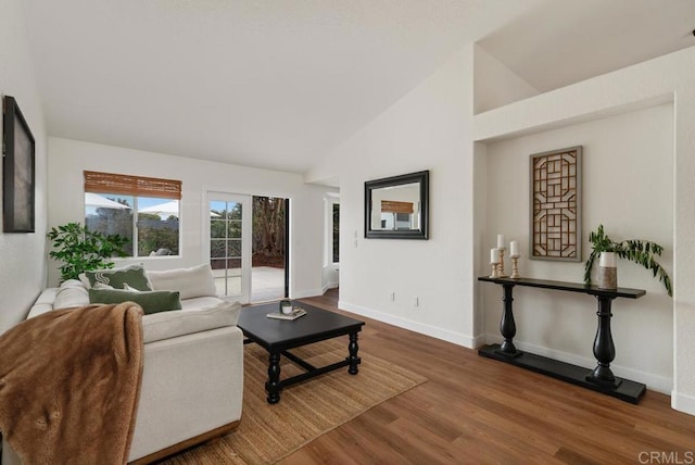 2663 Sutter St, Carlsbad, CA 92010 - living area with wood finished floors and high vaulted ceiling