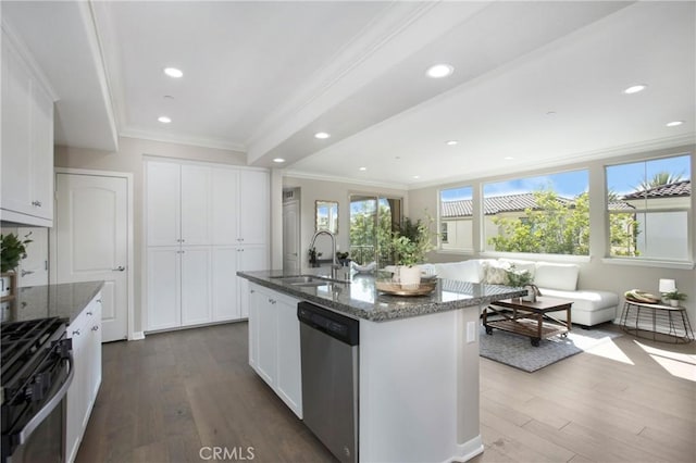 402 Maravilla Ln, Brea, CA 92823 - kitchen featuring appliances with stainless steel finishes, ornamental molding, dark wood-style floors, dark stone counters, and white cabinetry
