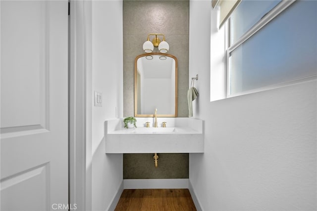 16229 Orizaba Ave, Paramount, CA 90723 - bathroom featuring wood finished floors and baseboards