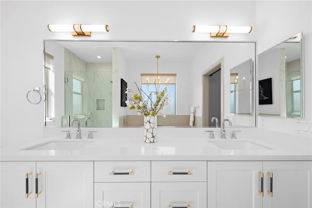 16229 Orizaba Ave, Paramount, CA 90723 - full bathroom with double vanity, a shower stall, and a chandelier