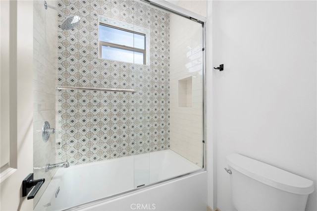 16229 Orizaba Ave, Paramount, CA 90723 - bathroom with toilet and bath / shower combo with glass door