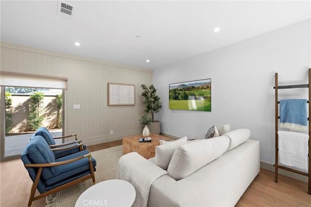16229 Orizaba Ave, Paramount, CA 90723 - living area featuring light wood finished floors and recessed lighting