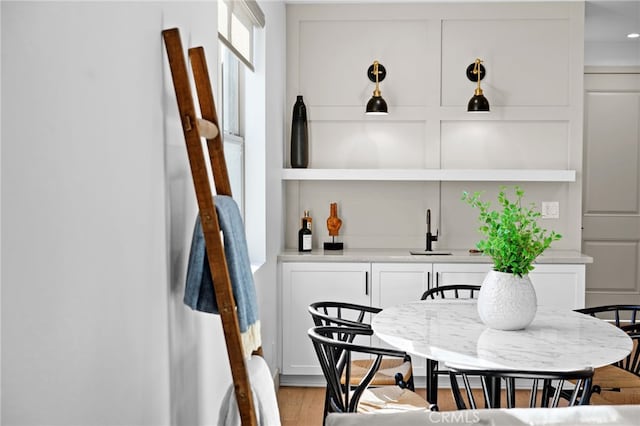 16229 Orizaba Ave, Paramount, CA 90723 - dining space featuring wet bar and light wood-style floors