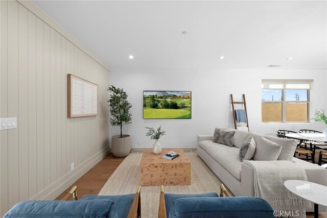 16229 Orizaba Ave, Paramount, CA 90723 - living area featuring wood finished floors and recessed lighting