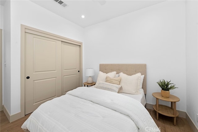 16229 Orizaba Ave, Paramount, CA 90723 - bedroom with light wood-style flooring, a closet, and recessed lighting