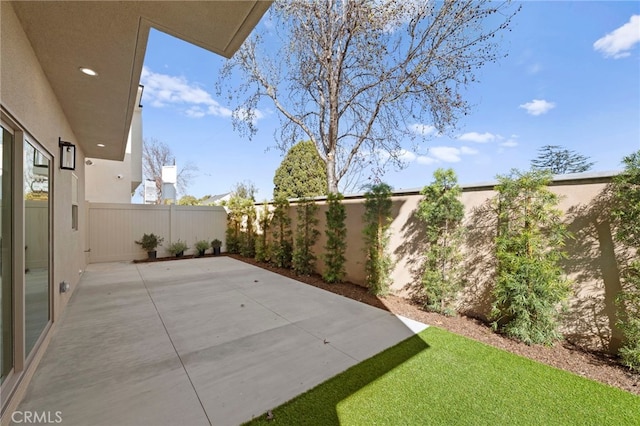 16229 Orizaba Ave, Paramount, CA 90723 - fenced backyard featuring a patio