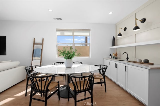 16229 Orizaba Ave, Paramount, CA 90723 - dining space featuring light wood finished floors and recessed lighting