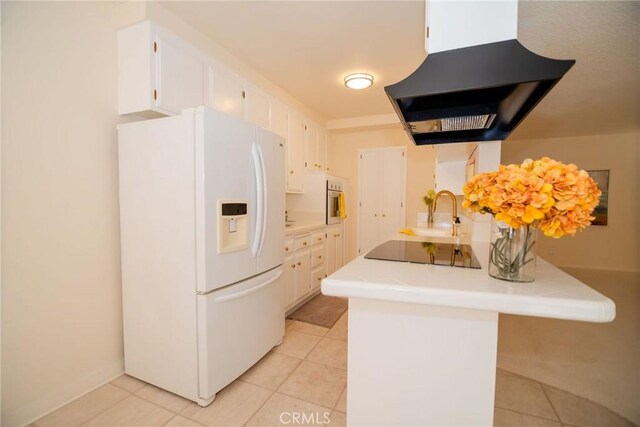 8710 Delgany Ave Unit 15, Playa Del Rey, CA 90293 - kitchen featuring white fridge with ice dispenser, wall chimney range hood, black electric stovetop, and white cabinetry
