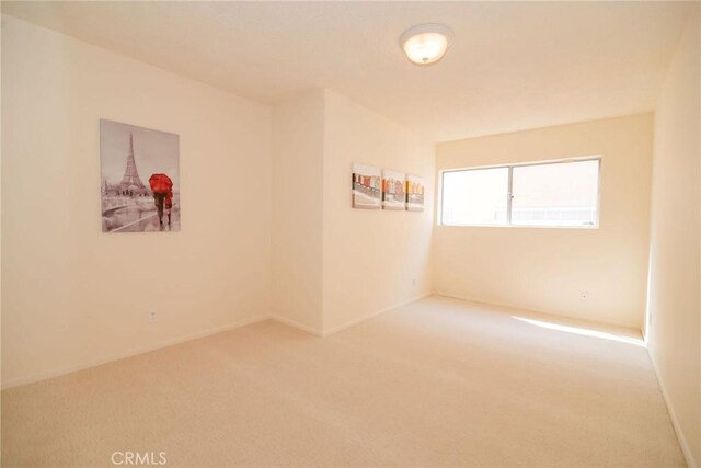 8710 Delgany Ave Unit 15, Playa Del Rey, CA 90293 - carpeted empty room featuring baseboards