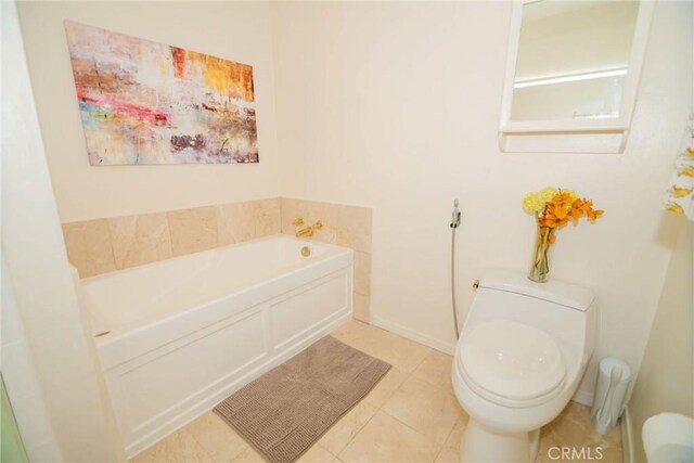 8710 Delgany Ave Unit 15, Playa Del Rey, CA 90293 - bathroom with a garden tub and tile patterned floors
