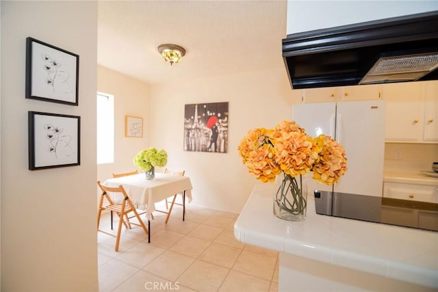 8710 Delgany Ave Unit 15, Playa Del Rey, CA 90293 - detailed view of freestanding refrigerator and black electric cooktop