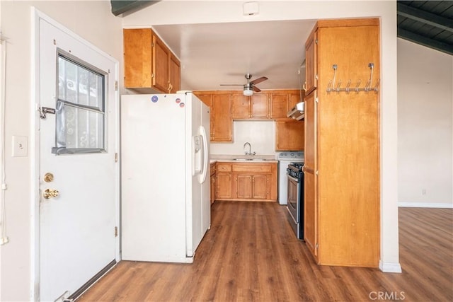 532 W 2nd St, Azusa, CA 91702 - kitchen featuring white fridge with ice dispenser, stainless steel range oven, dark wood-type flooring, ceiling fan, and under cabinet range hood