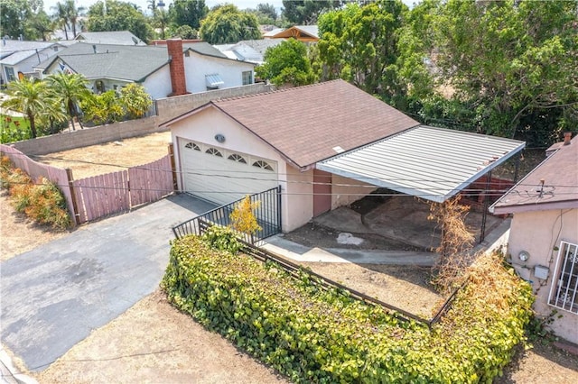532 W 2nd St, Azusa, CA 91702 - view of front of home featuring driveway, a shingled roof, a residential view, stucco siding, and a garage