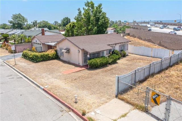 532 W 2nd St, Azusa, CA 91702 - view of front of home with a gate