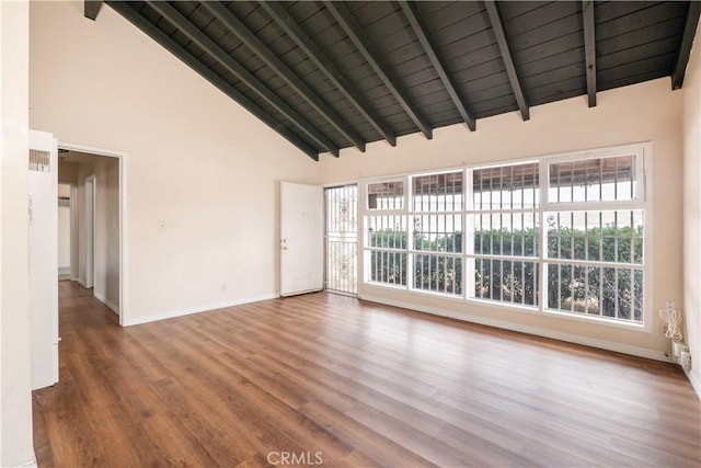 532 W 2nd St, Azusa, CA 91702 - unfurnished living room featuring a wood ceiling with exposed beams, wood finished floors, and high vaulted ceiling