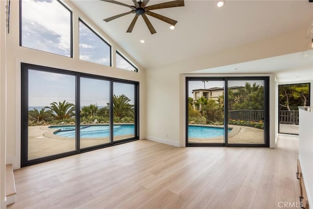 34693 Camino Capistrano Unit B, Dana Point, CA 92624 - spare room with ceiling fan, high vaulted ceiling, wood finished floors, and recessed lighting