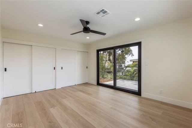 34693 Camino Capistrano Unit B, Dana Point, CA 92624 - unfurnished bedroom featuring access to exterior, multiple closets, light wood-style floors, recessed lighting, and a ceiling fan