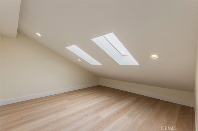 34693 Camino Capistrano Unit B, Dana Point, CA 92624 - additional living space with lofted ceiling, a skylight, light wood-style flooring, and recessed lighting