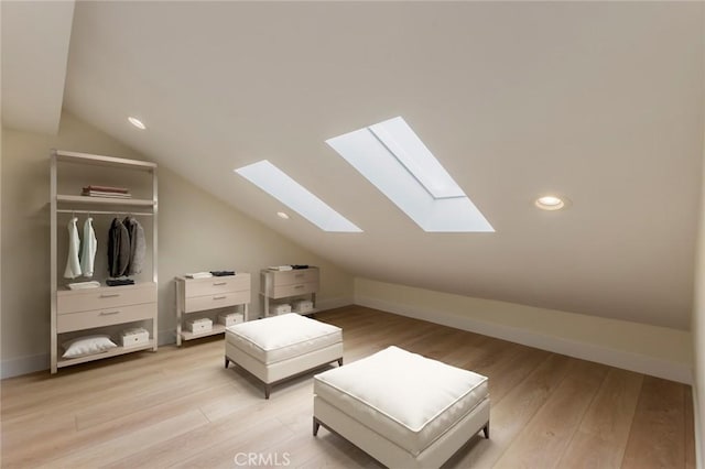 34693 Camino Capistrano Unit B, Dana Point, CA 92624 - bedroom with a skylight, vaulted ceiling, light wood finished floors, a closet, and recessed lighting