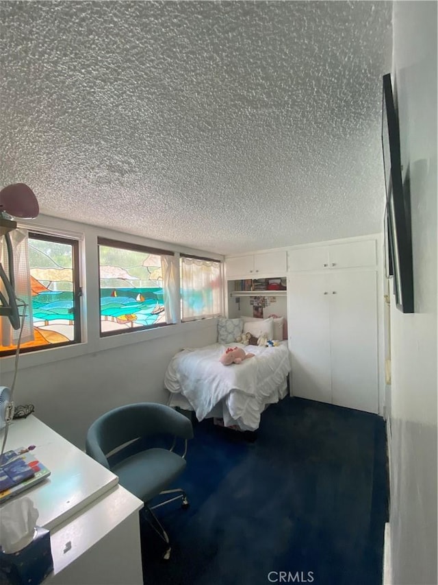 1210 7th Pl, Hermosa Beach, CA 90254 - bedroom with a textured ceiling and multiple windows