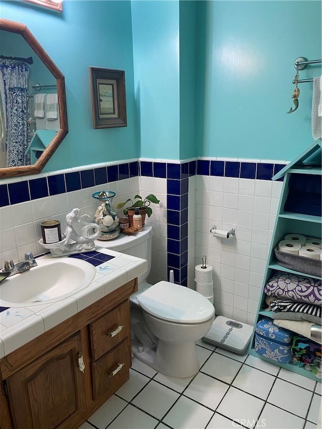 1210 7th Pl, Hermosa Beach, CA 90254 - bathroom featuring vanity, tile walls, and tile patterned flooring